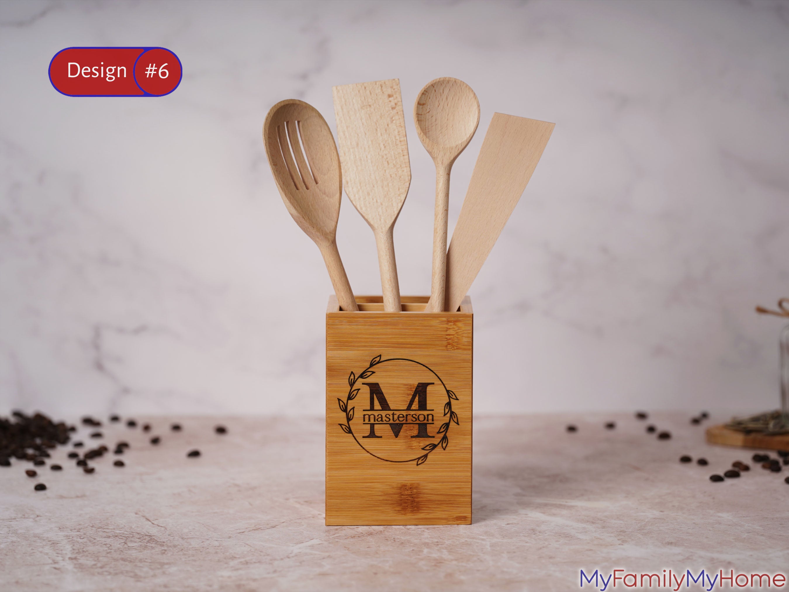 Personalized bamboo utensil holder with custom monogram 'M' and name 'Masterson', ideal for organizing kitchen tools on countertops. Great for weddings or housewarming gifts.