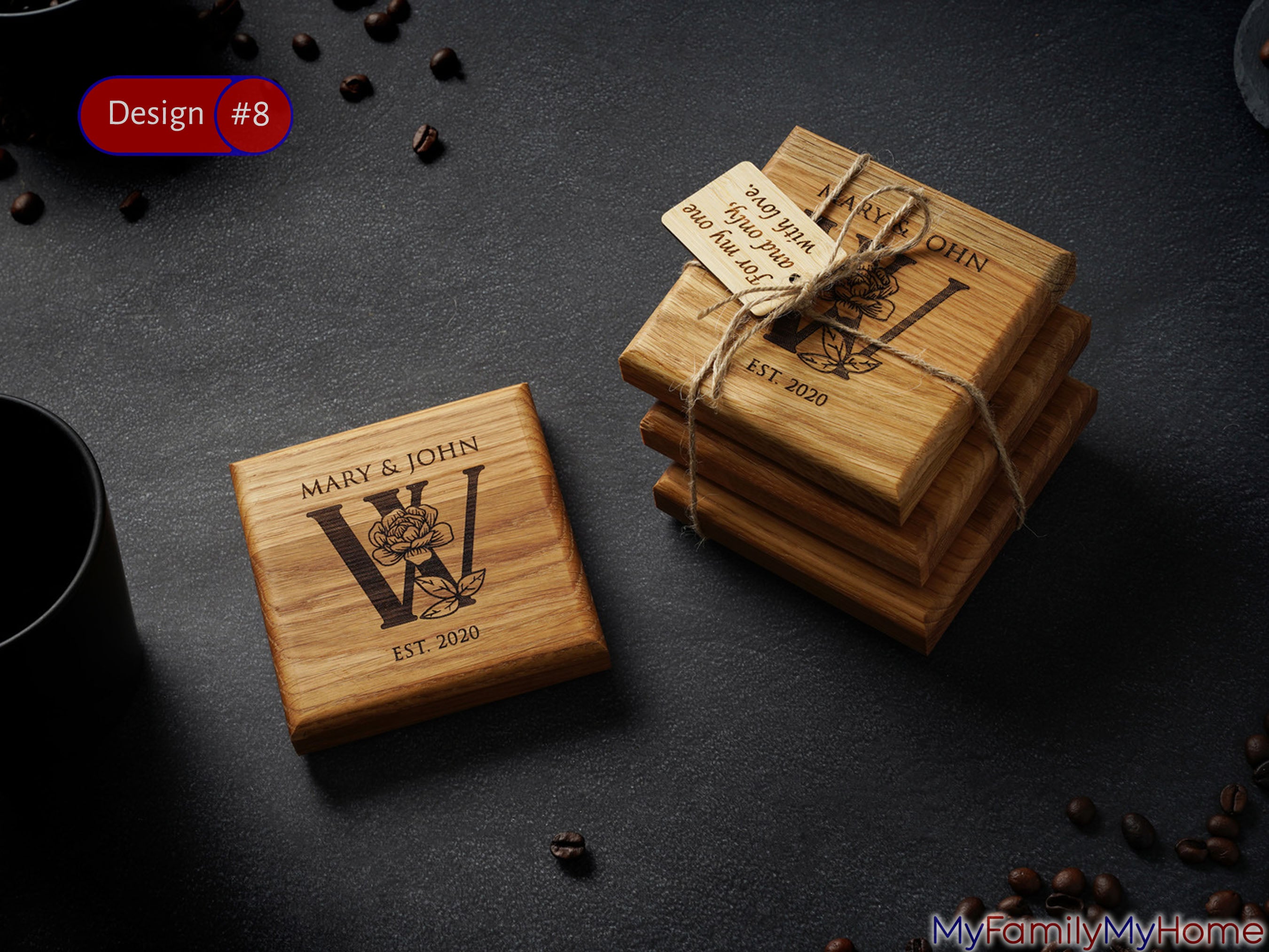 Personalized wooden cup coasters with custom engraving featuring floral monogram and names, ideal for housewarming or birthday gifts.