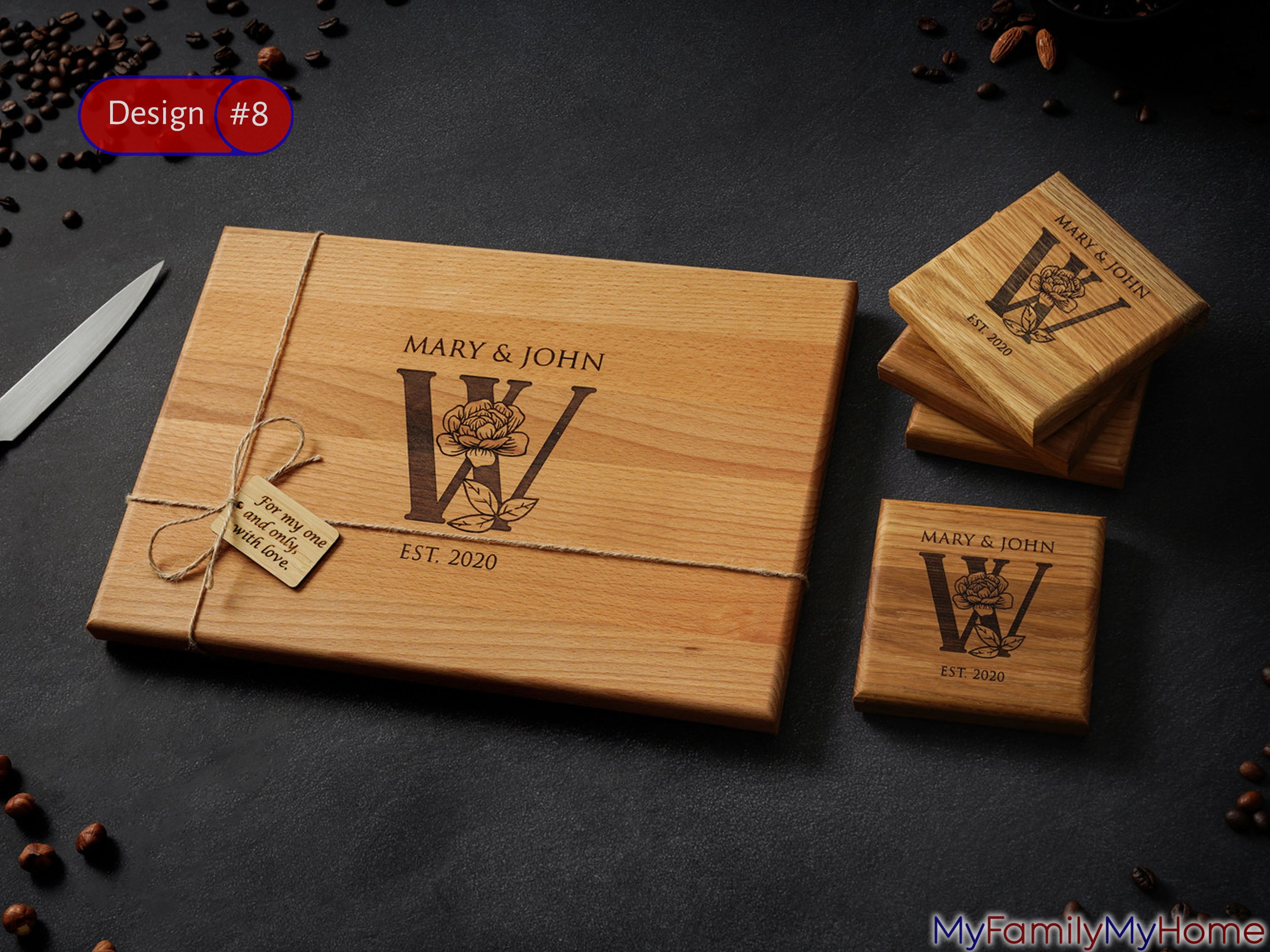 Personalized engraved cutting board with coasters featuring floral monogram and custom names, ideal for weddings or 5th anniversary gifts.