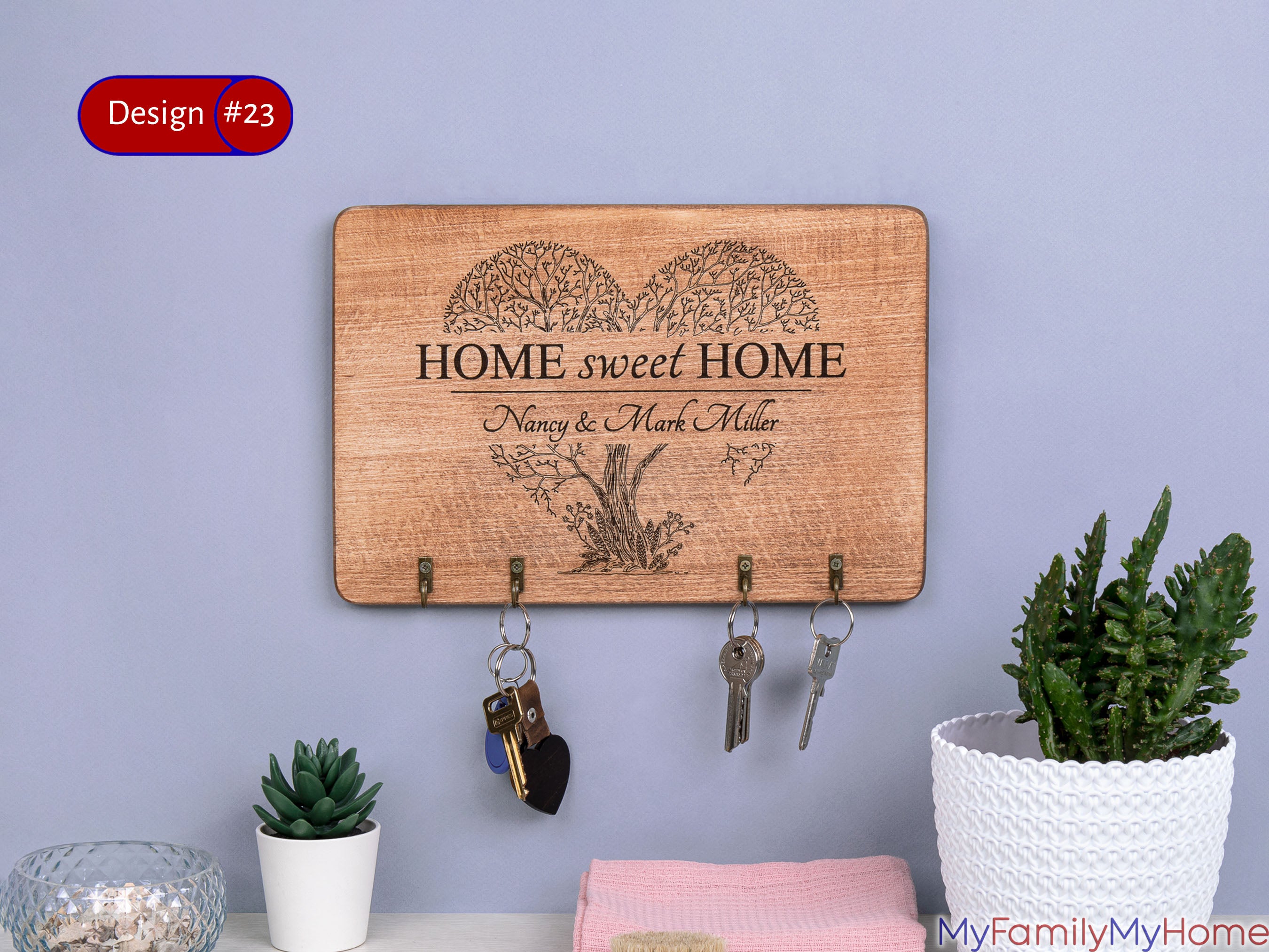Personalized Key Holder with Home Sweet Home Engraving features a rustic wood design with tree and heart motif, ideal for entryway decor or gifting.