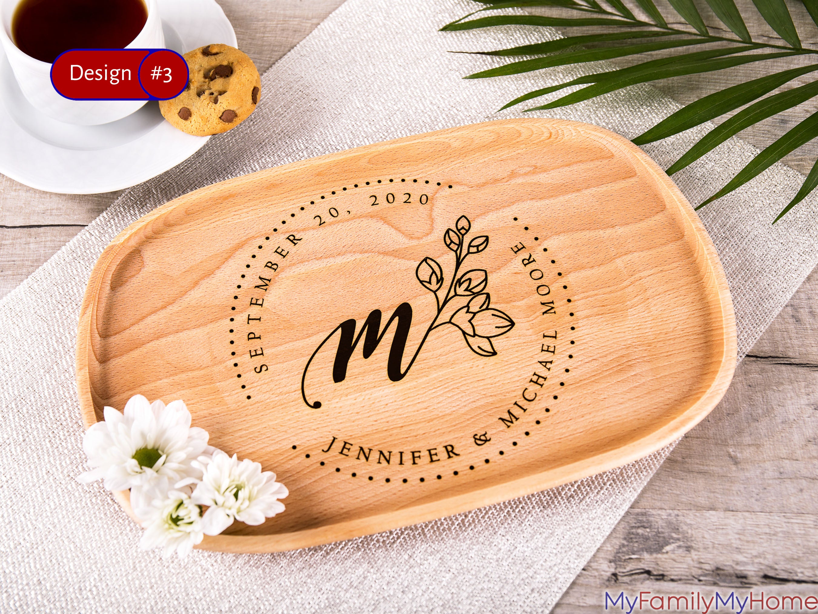 Monogrammed wooden plate for anniversary or wedding featuring engraved floral design, couple's names, and date, ideal for 5th anniversary gifts.